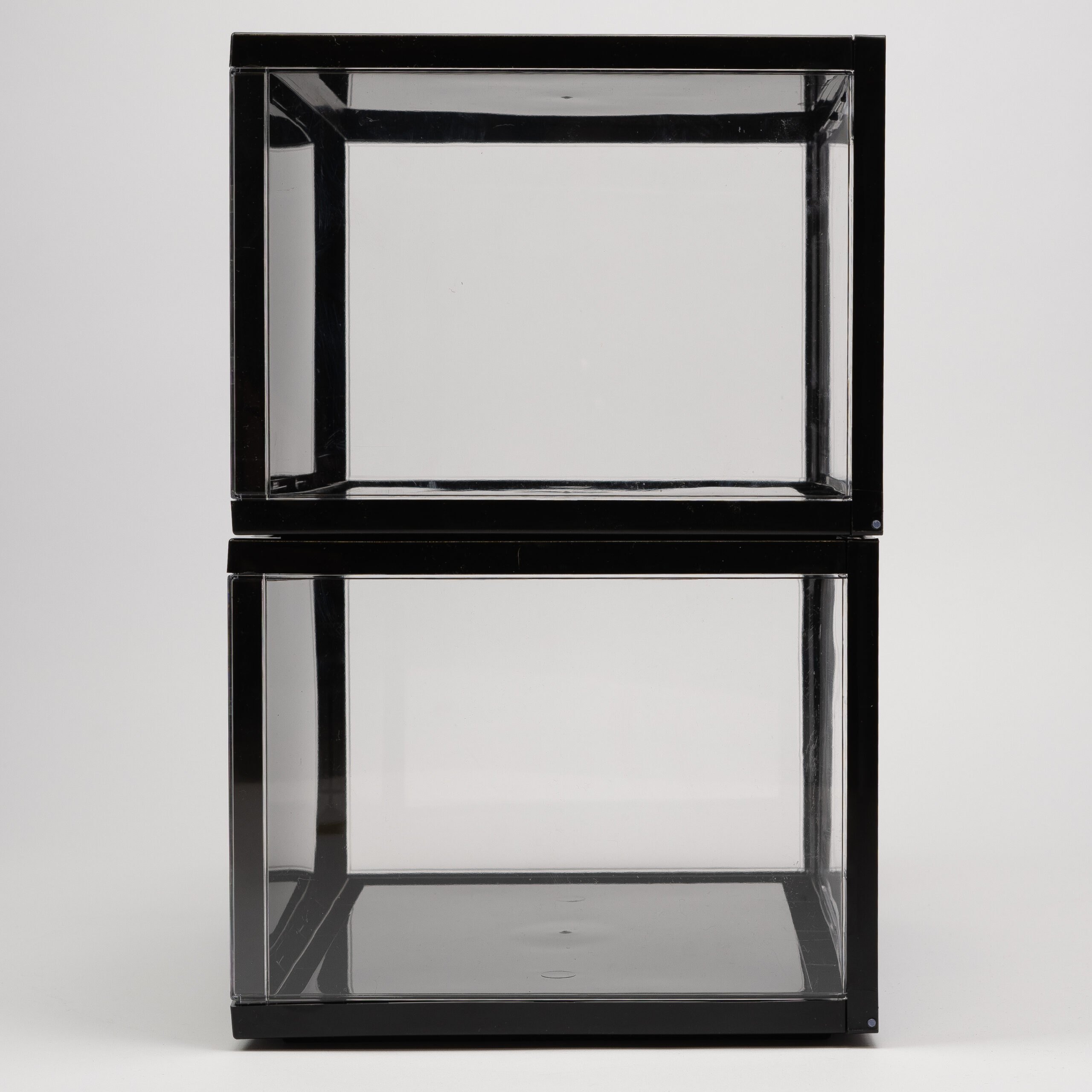 black shoe storage crates empty