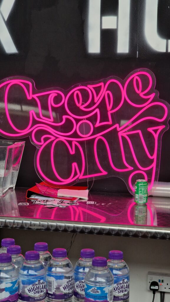 Crepe City LED sign in Glasgow
