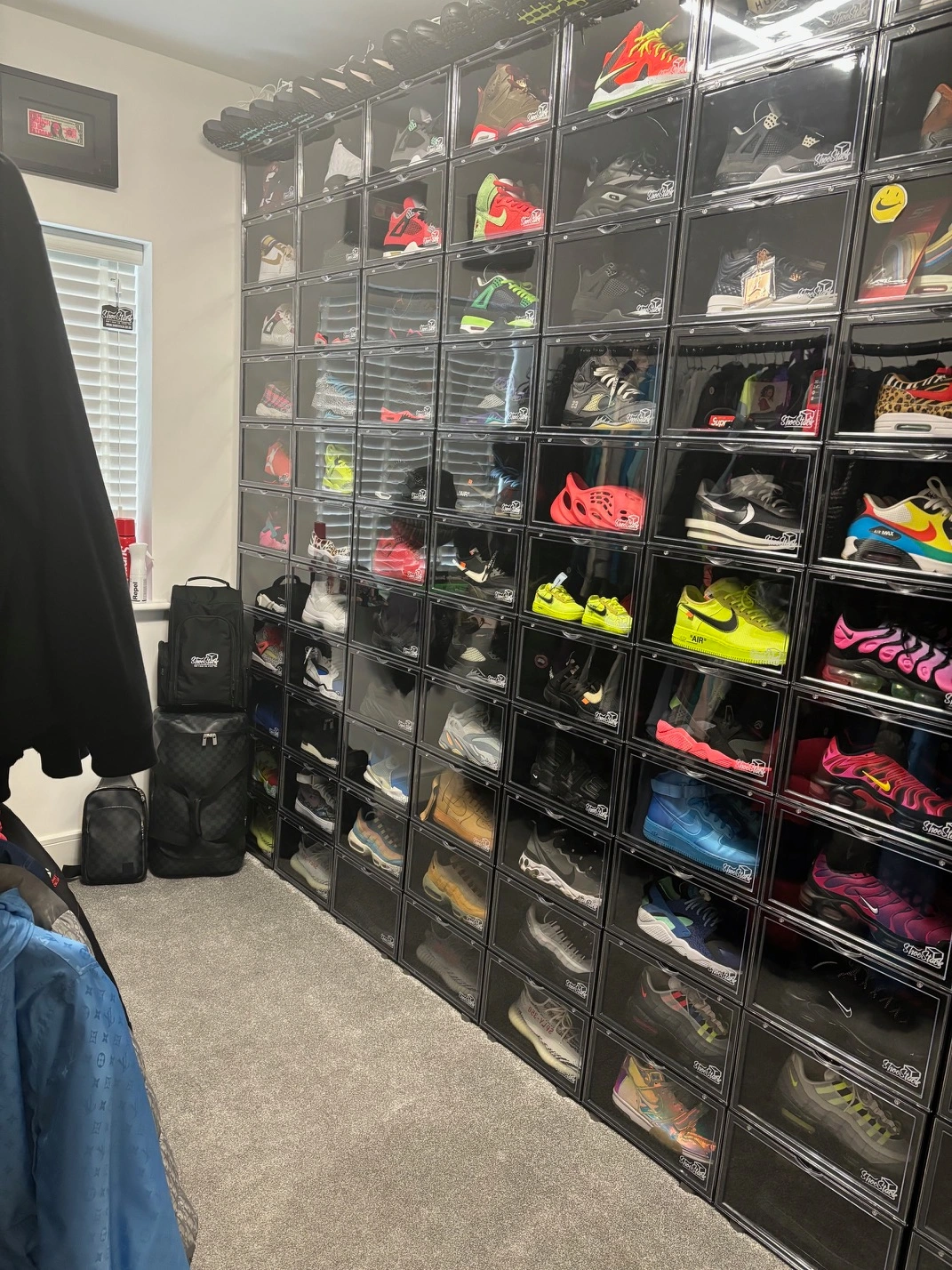 100 black side view shoe boxes stacked up 100 shoes wall shoestack